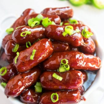 One Pot Grape Jelly Little Smokies in White Dish.