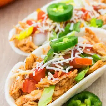 Stovetop One Pot Mexican Shredded Chicken in Flour Tortillas.