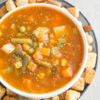 Easy One Pot Vegetable Soup in White Bowl.