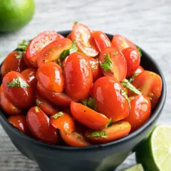 Easy One Pot Tomato Salad on Rustic Gray Background.