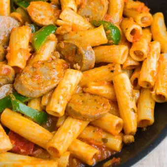 One Pot Italian Sausage Pasta in Black Pot- Overhead Shot.