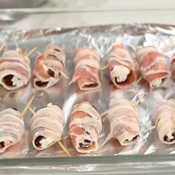 Prepared dates placed on a lined tray.