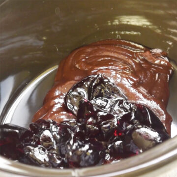 Grape jelly, bbq sauce, liquid smoke in crockpot. 