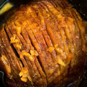 Easy Slow Cooker Ham Recipe with Pineapples and Brown Sugar