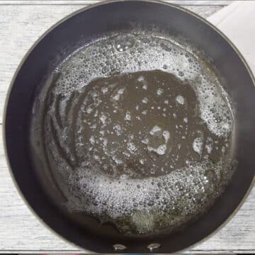 Melted butter and oil in a nonstick pot. 
