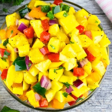 Best easy homemade mango salsa in glass bowl- Overhead shot.