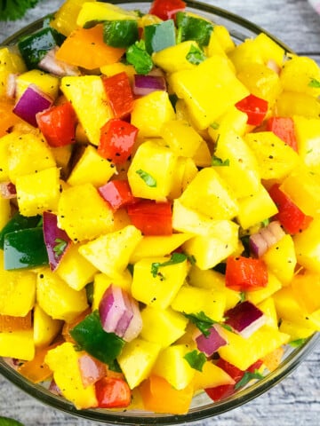 Best easy homemade mango salsa in glass bowl- Overhead shot.