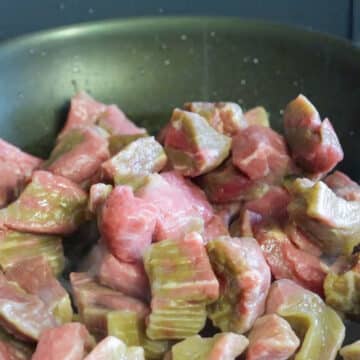 Steak cubes being sauted in oil.