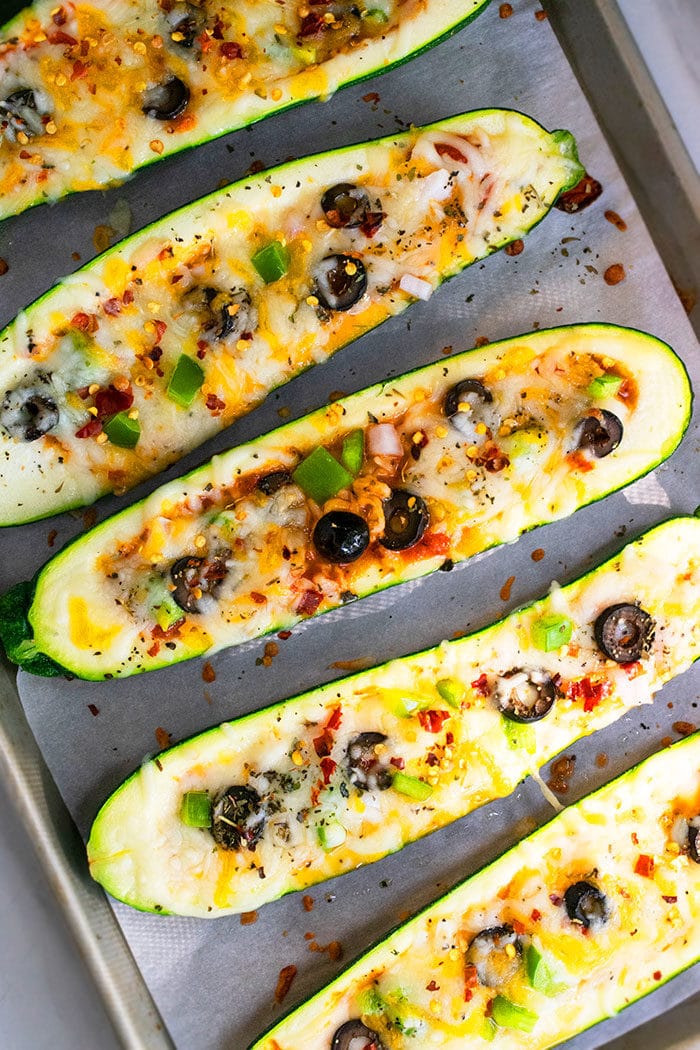 Baked Zucchinis Stuffed with Cheese and Vegetables