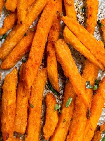 Easy homemade Crispy oven baked sweet potato fries in sheet pan.