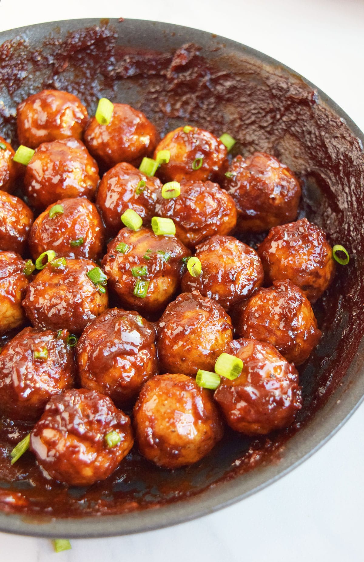 Pepsi or Coca Cola Meatballs in nonstick pan. 