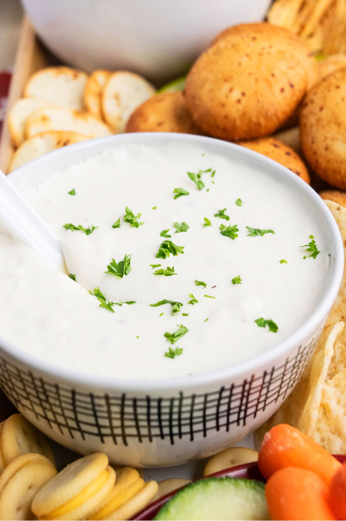 Easy homemade veggie dip in white bowl.