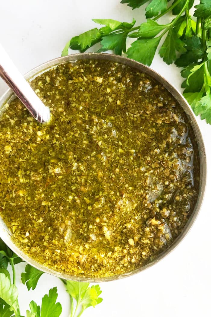 Easy basil pesto sauce in bowl-Overhead shot. 