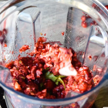 ingredients being coarsely chopped in blender.