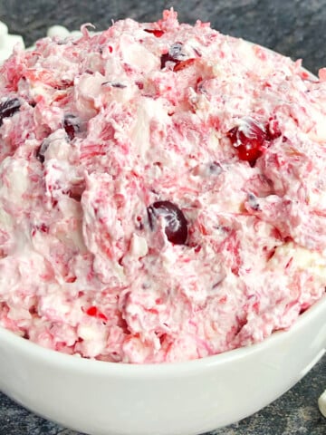 Easy Creamy Cranberry Salad or Cranberry Fluff in White Bowl.