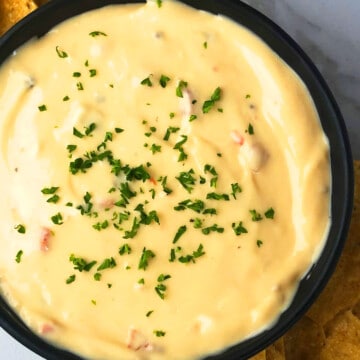 Best Easy Homemade Queso Dip (Mexican Cheese Dip) in Black Bowl- Overhead Shot.