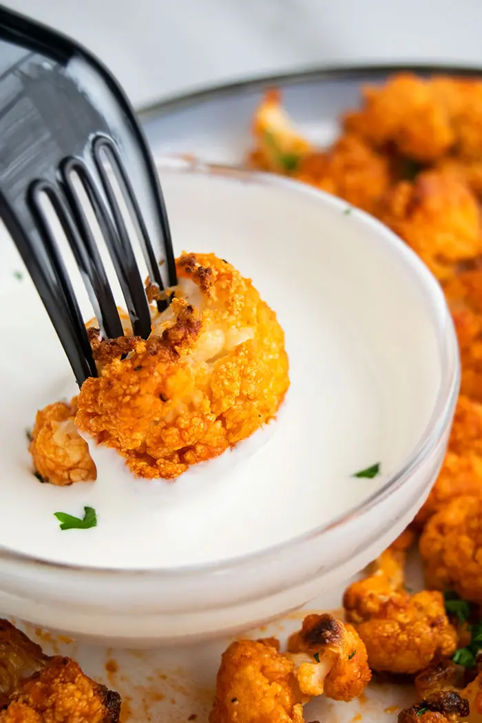 Cauliflower Buffalo Wings Dipped In Ranch Sauce