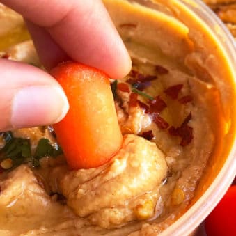 Bowl of Roasted Red Pepper Hummus For Dipping Carrots