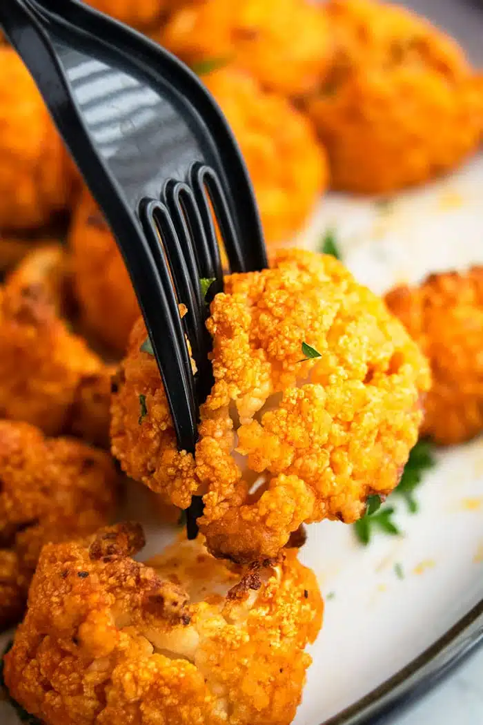 Vegetarian Crispy Cauliflower Hot Wings on a Fork