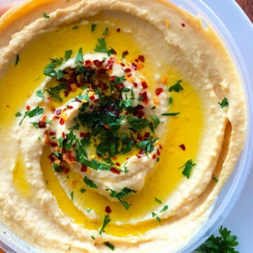Best Easy Homemade Hummus in White Bowl- Overhead Shot.