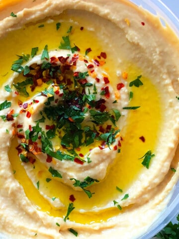 Best Easy Homemade Hummus in White Bowl- Overhead Shot.