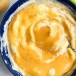 Easy Homemade Vegetarian Gravy in Blue Bowl of Mashed Potatoes