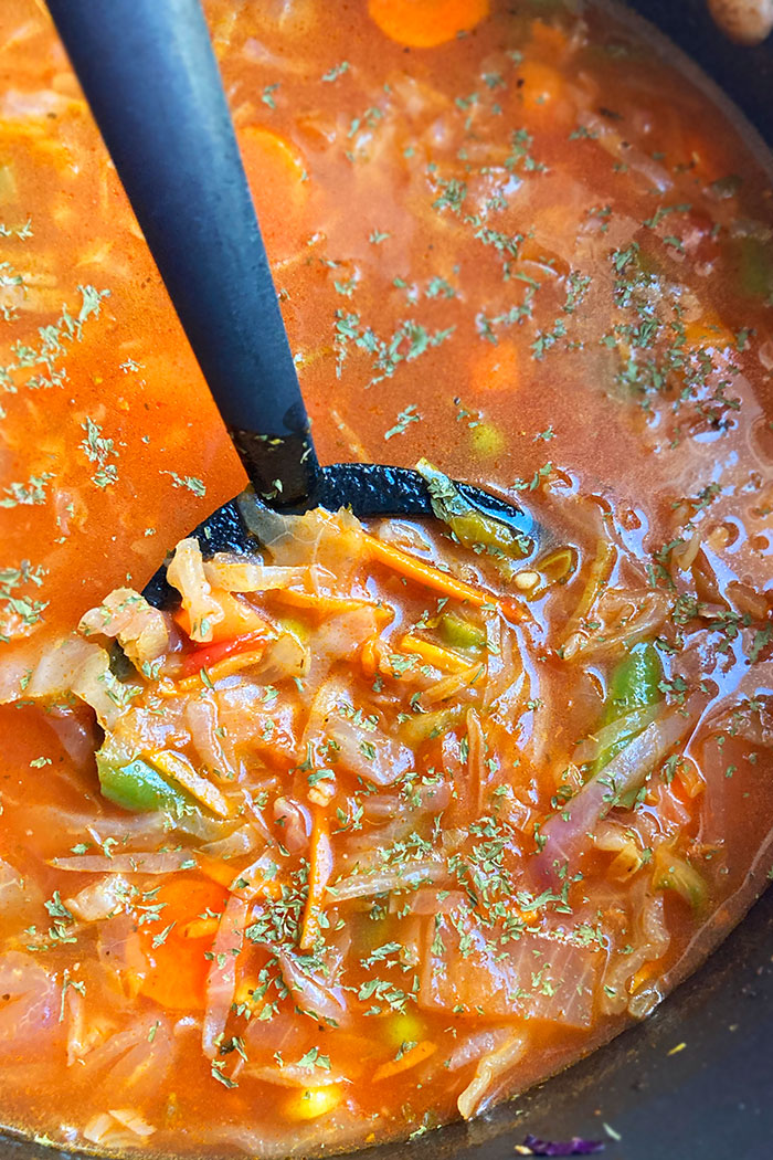 Overhead Shot of the Best Vegetarian Cabbage Soup in Nonstick Pot