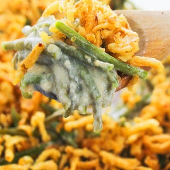 Spoonful of Best Green Bean Casserole with Fried Onions- Closeup Shot
