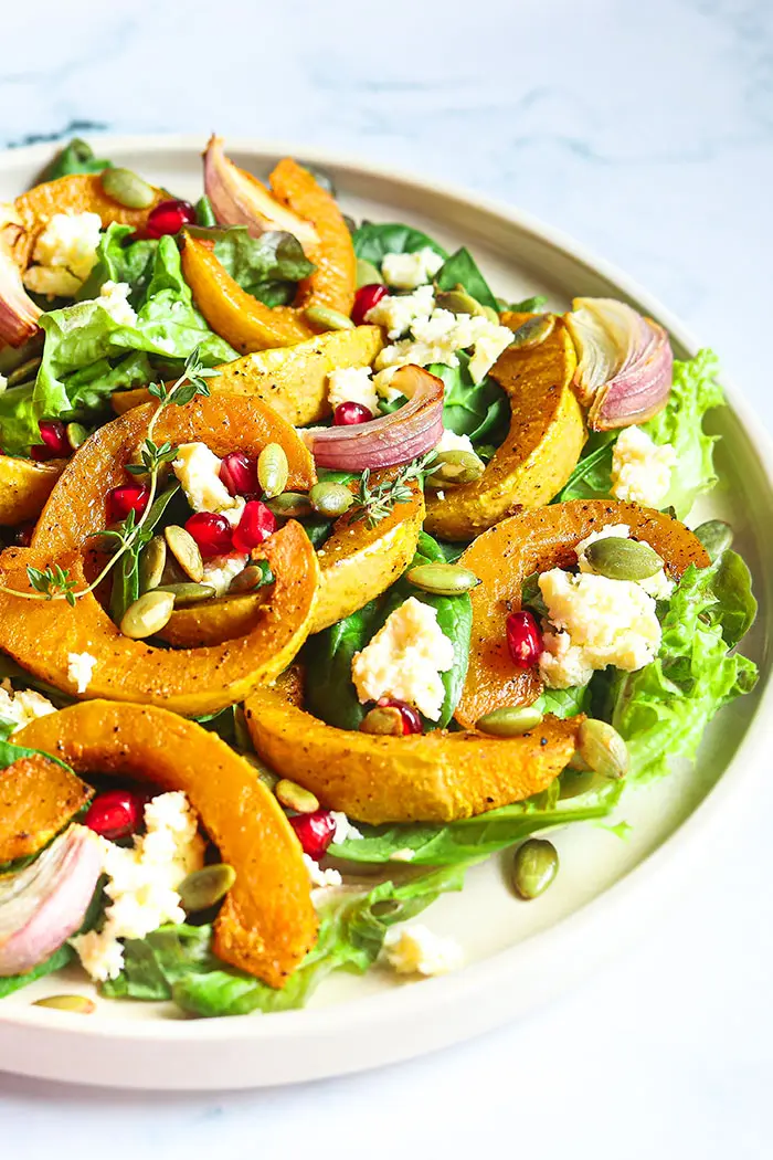 Easy Homemade Pumpkin Salad with Lemon Vinaigrette Dressing on White Plate