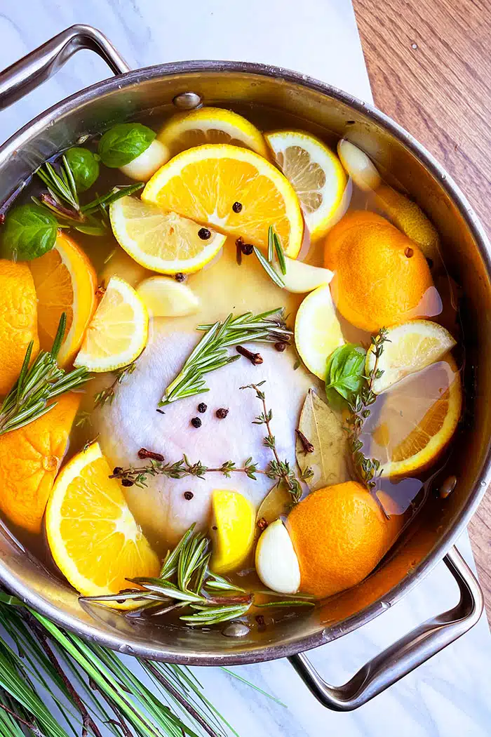 Homemade Turkey Brine in Silver Pot on White Background