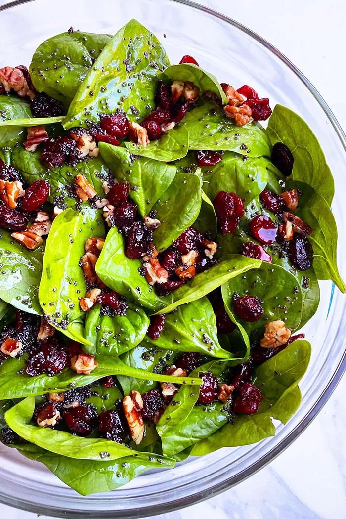 Christmas Salad in Glass Salad Bowl on White Background