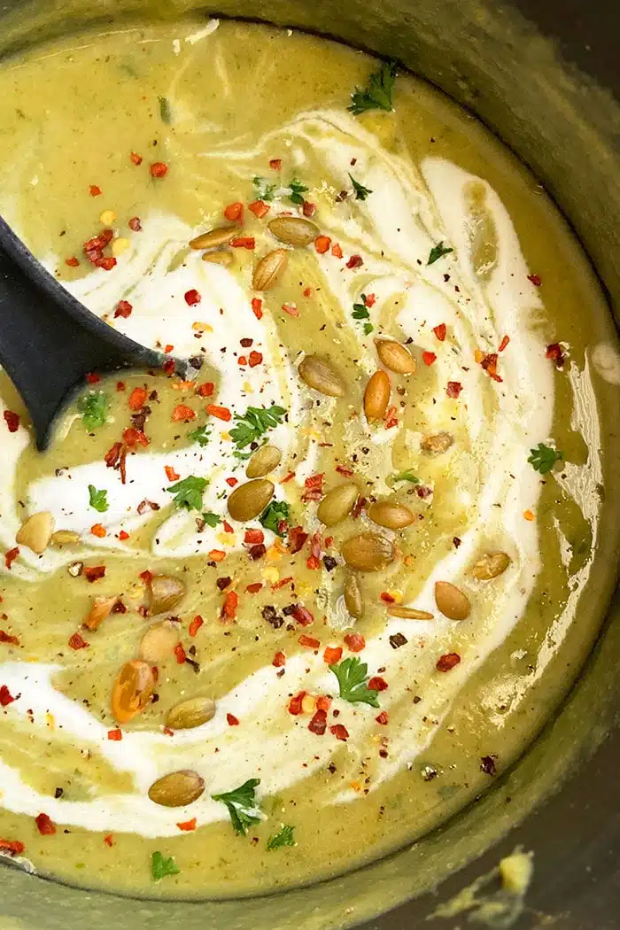 Cream of Broccoli Soup in Black Pot- Overhead Shot