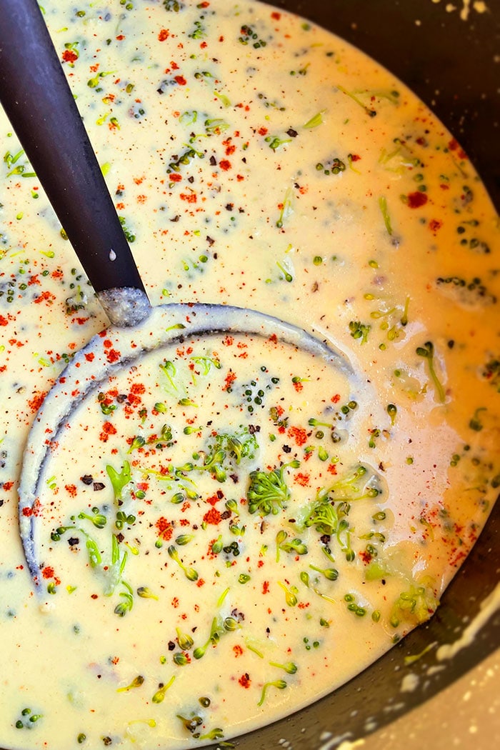 Overhead Shot of Creamy Cheesy Broccoli Soup in Nonstick Pot
