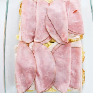 Meat placed on top of Hawaiian rolls.