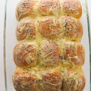 Tops of rolls brushed with garlic butter.