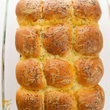 Baked golden brown rolls fresh out of the oven- overhead shot.