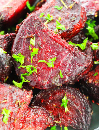 Easy Homemade Oven Roasted Beets in Black Plate with Italian Herbs on Black Plate