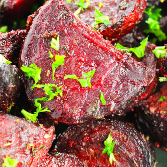 Easy Homemade Oven Roasted Beets in Black Plate with Italian Herbs on Black Plate