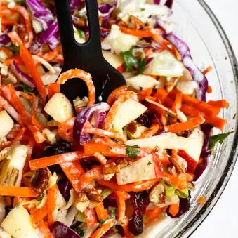 Easy Apple Coleslaw in Glass Bowl on White Background