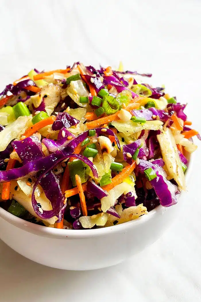 Easy Asian Slaw in White Bowl on White Background