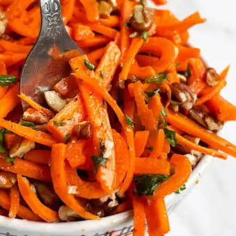 Easy Homemade Carrot Slaw in White Bowl