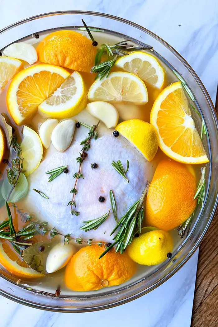 Easy Whole Chicken Brine Recipe in Glass Bowl on White Background