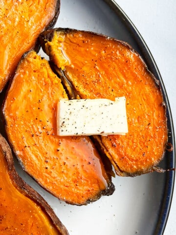 Easy Instant Pot Sweet Potatoes Served in White Dish on White Background