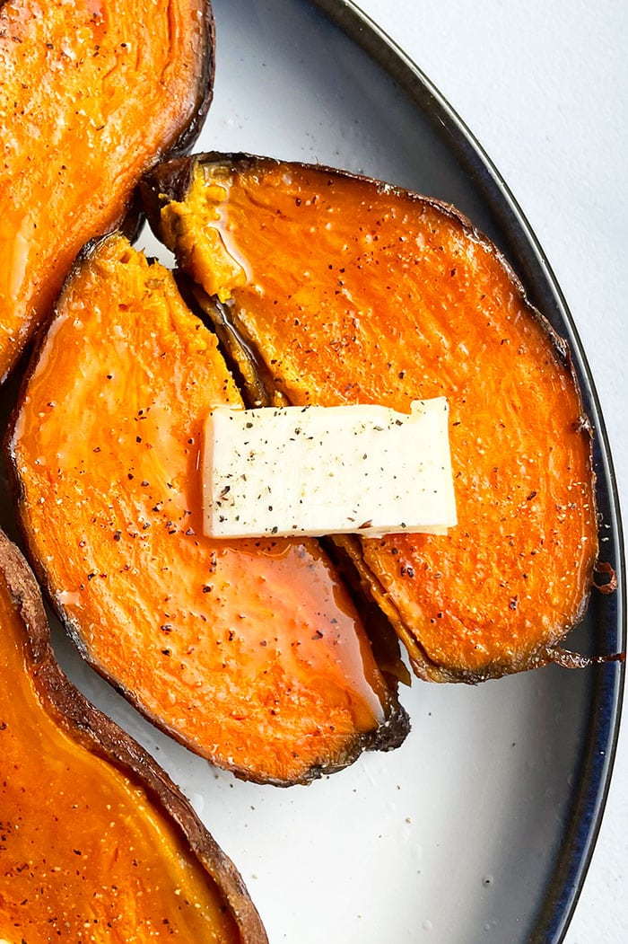 Instant Pot Sweet Potatoes Served in White Dish on White Background