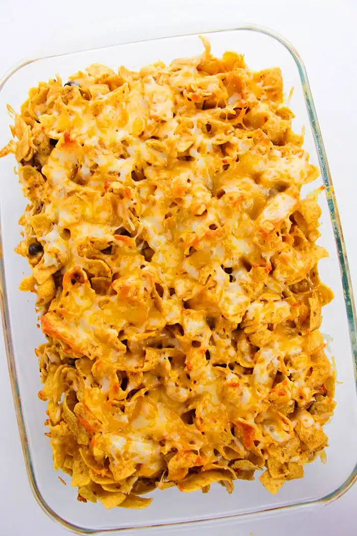 Cheesy Savory Pie With Fritos and Chili in Glass Dish- Overhead Shot