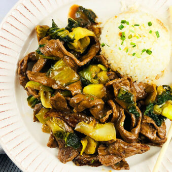 Easy Instant Pot Ginger Beef Served in White Plate With Steamed Rice- Overhead Shot