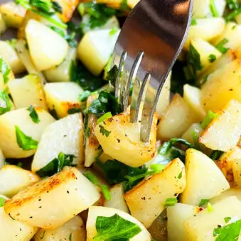 Fork Full of Easy Parsley Potatoes- Closeup Shot