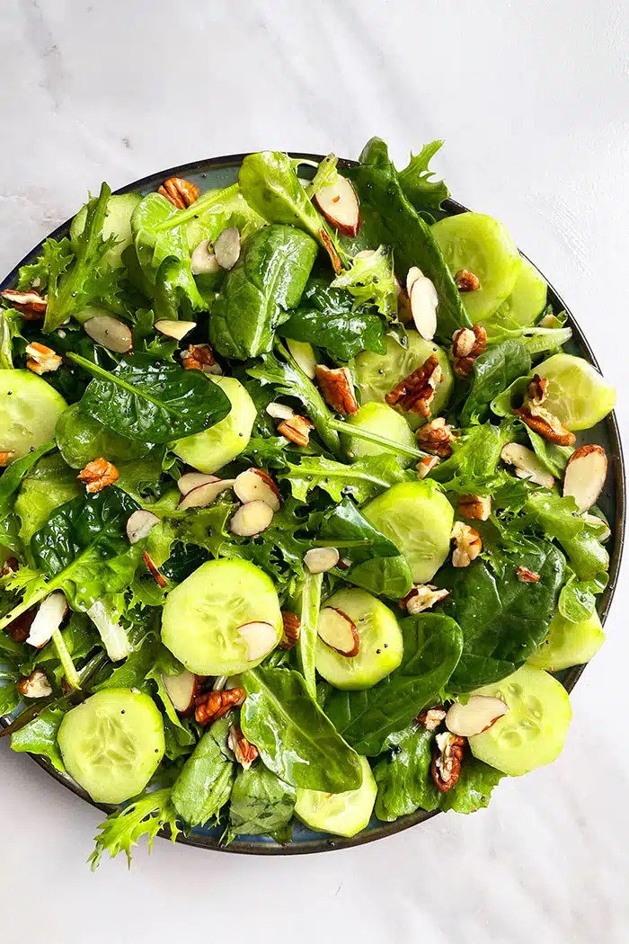 Easy Green Salad With Lemon Vinaigrette in Plate- Overhead Shot