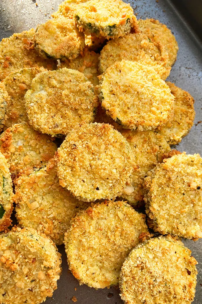 Baking Tray Filled With Crispy Courgette Chips