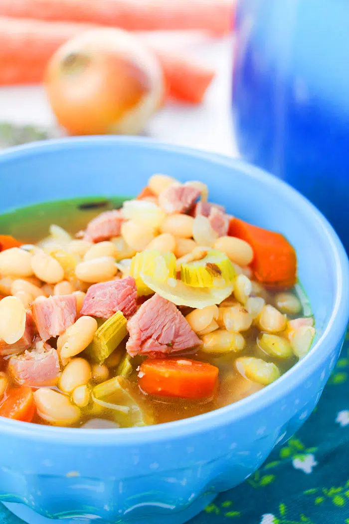 Instant Pot Ham Bone Soup Served in Blue Bowl